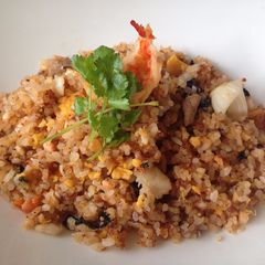 A picture of Fried Rice with Sushi .