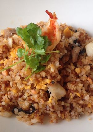 A picture of Fried Rice with Sushi .