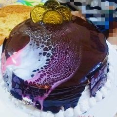A picture of Leopard print Glaze cake.