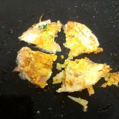 Egg fry, with radish leave and onion A picture of Egg fry, with radish leave and onion.