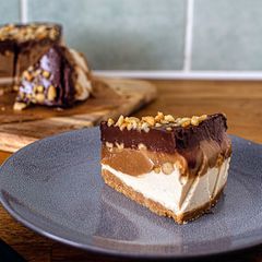 A picture of Vegan “No-Bake” Snickers Cake.