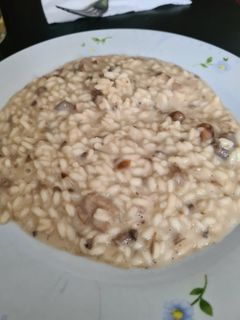 Una foto de Risotto de setas con parmesano