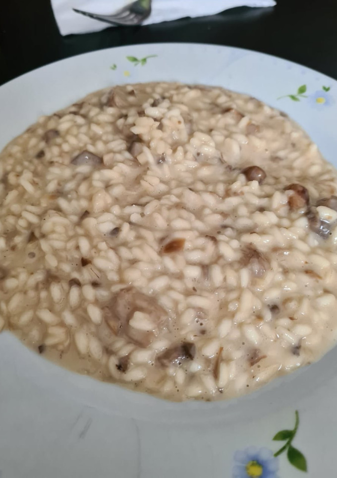 Una foto de Risotto de setas con parmesano
