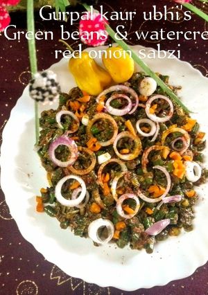 A picture of Green beans & watercress red onion sabzi 🥬🧅.