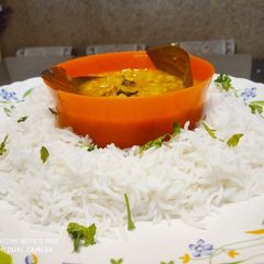 A picture of Chholar Dal with Boiled Rice.