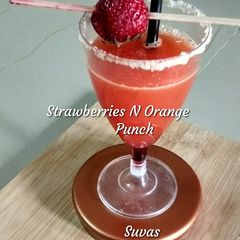 A picture of Fresh Strawberries And Orange Punch.