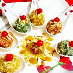 A picture of Mango, mutter and Carrot Flavour Coconut laddu.