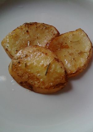 Una foto de Papas (patatas) horneadas condimentadas