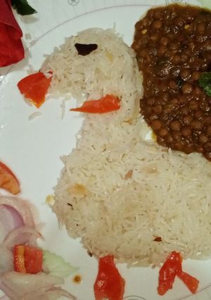 A picture of Kalay masoor ki Daal with zeera rice.