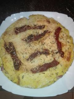 Una foto de Pastel de pizza de pan de molde jugosa en la olla GM g
