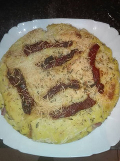 Una foto de Pastel de pizza de pan de molde jugosa en la olla GM g