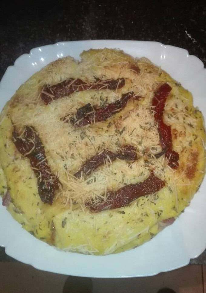 Una foto de Pastel de pizza de pan de molde jugosa en la olla GM g