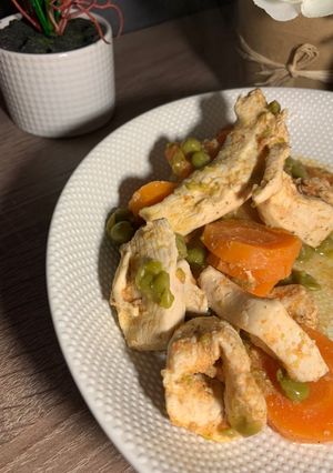 Une photo de Tajine poulet petits pois et carottes