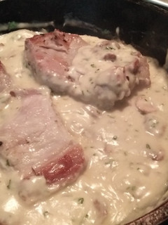 Una foto de Chancho con Champiñones