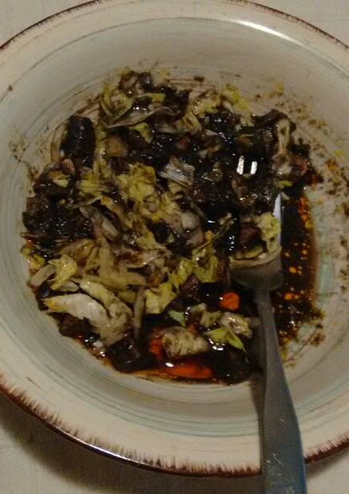 Una foto de Ensalada de pulpos en su tinta. ॐ