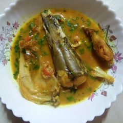 Fish head curry with tomato A picture of Fish head curry with tomato.
