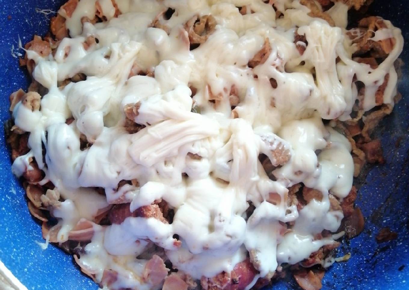 Alambre de res, puerco con jamón y queso fundido