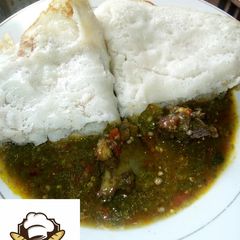 A picture of Sinasir with okro soup.