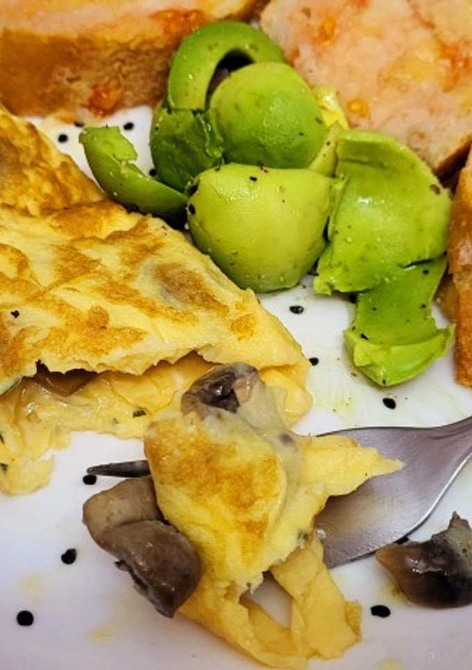 Una foto de Tortilla a la francesa de champiñones y queso