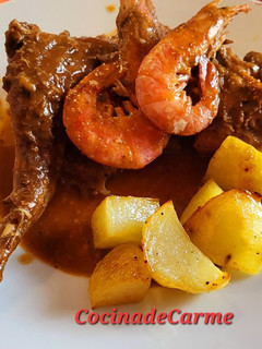 Una foto de Conejo en salsa con gambas