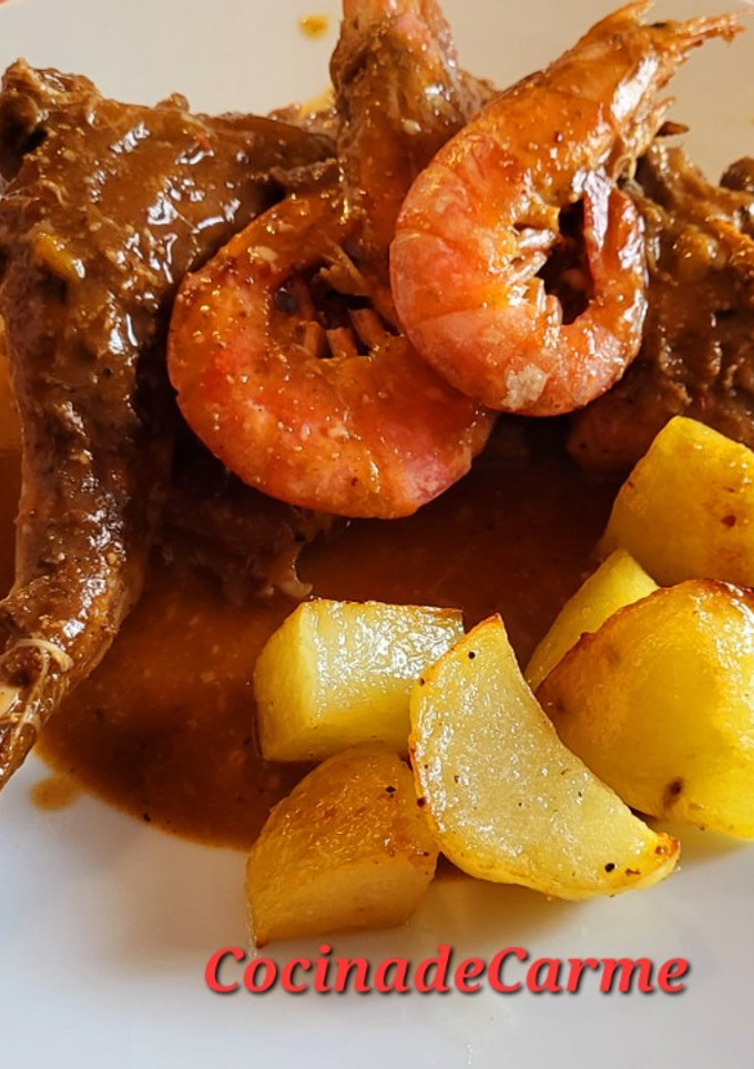 Una foto de Conejo en salsa con gambas