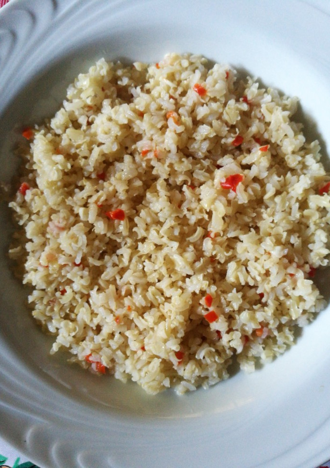 Una foto de Arroz integral con ajo y locote rojo