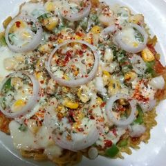 A picture of Maggi Pizza.