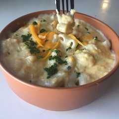 Una foto de Macarrones con Crema de Choclo y Cheddar