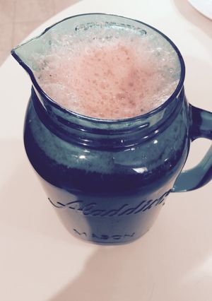 Una foto de Batido de col (repollo), zanahoria y naranjas