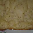 Torta de queso rallado, con paleta picada