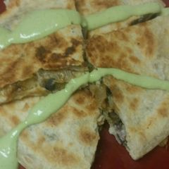 A picture of Vegetarian black bean curry quesadillas.
