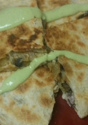 A picture of Vegetarian black bean curry quesadillas.