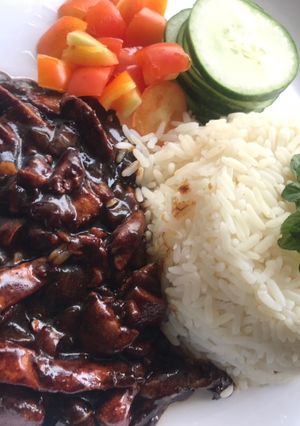 A picture of Mint rice and teriyaki sauce.