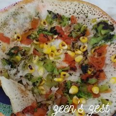A picture of Mixed Veg Uttappam.