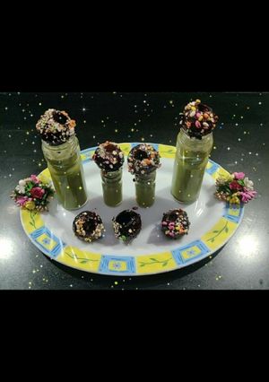 A picture of Chocolate golgappa with paan shots.