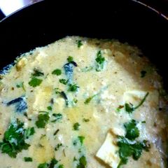 A picture of Nawabi Paneer Restaurant style paneer in white gravy.