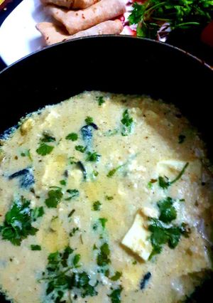 A picture of Nawabi Paneer Restaurant style paneer in white gravy.