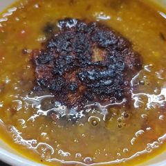 A picture of Soya lauki kofta curry.