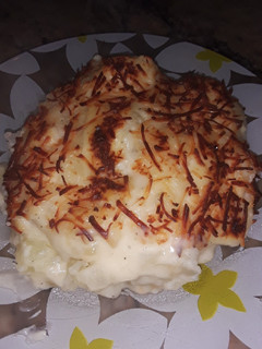 Una foto de Coliflor con patatas gratinadas