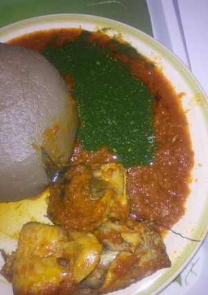 A picture of Amala, ewedu& catfish stew.