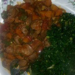 A picture of Chicken gizzard soup and sukuma.