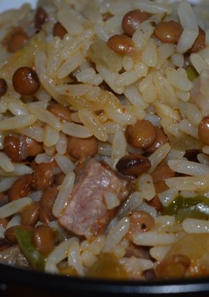 Una foto de Guisado de panceta lenteja y arroz
