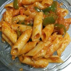 A picture of Pasta in red souce.