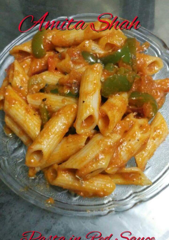 A picture of Pasta in red souce.