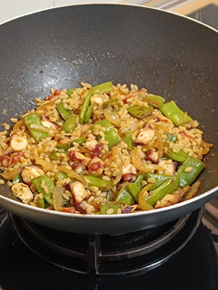 Una foto de Wok de pulpo con trigo tierno