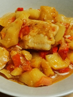 Una foto de Bacalao con patatas y pimiento