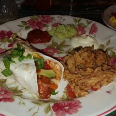 A picture of Mexican Burritos with Mexican Rice.