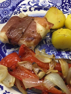 A picture of Cod in Parma ham with roasted vegetables #mycookbook.