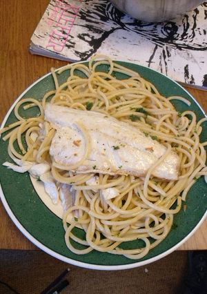 A picture of Pasta aglio olio con branzino.