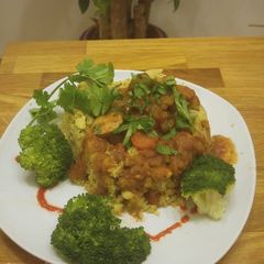 Mofongo Volcano w/Pollo Guisado (Chicken Stew) A picture of Mofongo Volcano w/Pollo Guisado (Chicken Stew).